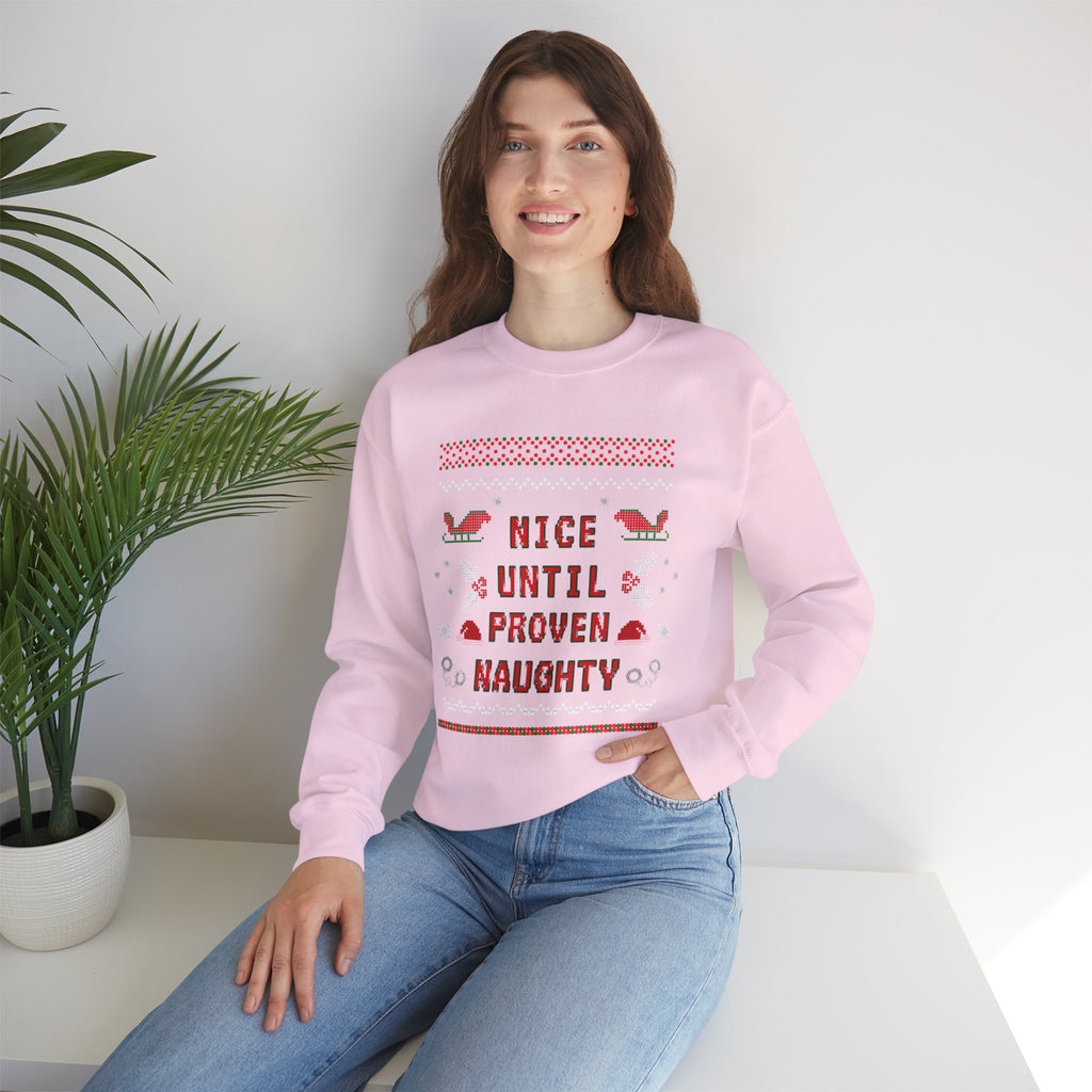 Nice Until Proven Naughty Christmas Sweatshirt — Funny Holiday Crewneck for Adults